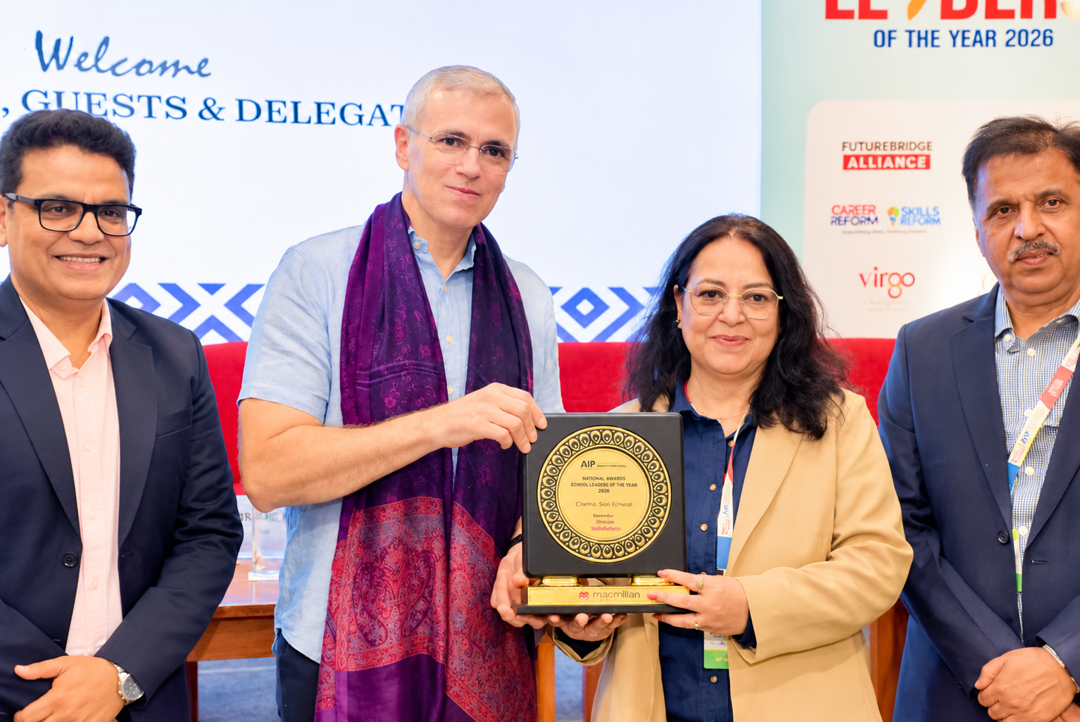 Dr. Chetna Sabharwal receiving her award at the 2026 School Leaders event